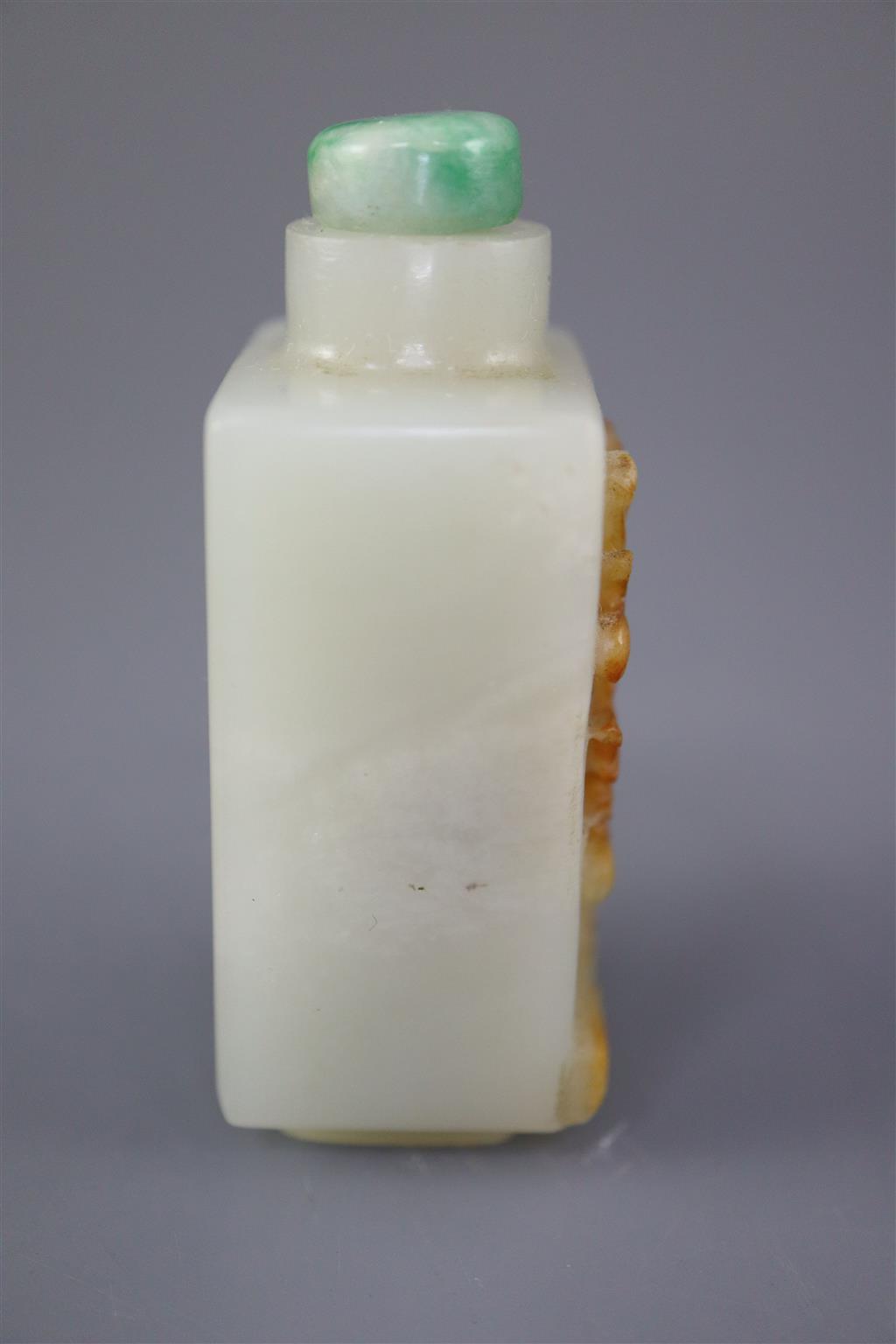 A Chinese pale celadon and russet jade rectangular snuff bottle, 19th century, 5.7cm excl. stopper